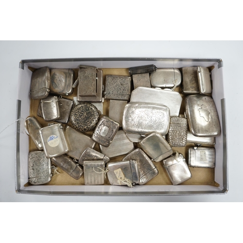 831 - A collection of twenty four assorted silver vesta cases, eight cigarette cases, two match sleeves an... 