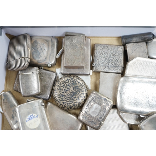 831 - A collection of twenty four assorted silver vesta cases, eight cigarette cases, two match sleeves an... 