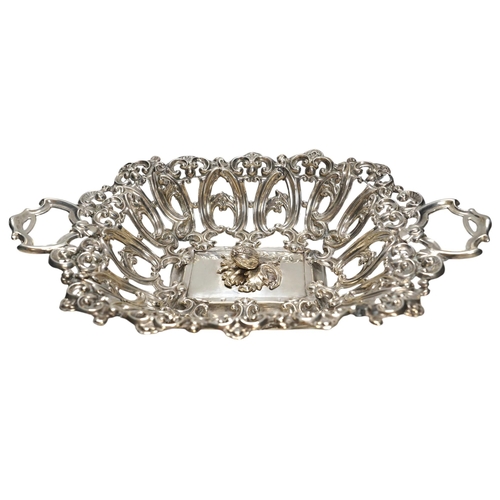 832 - A late 19th/early 20th century Austro-Hungarian pierced 800 white metal fruit bowl, with unusual rai... 