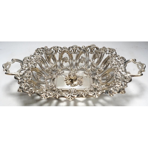 832 - A late 19th/early 20th century Austro-Hungarian pierced 800 white metal fruit bowl, with unusual rai... 