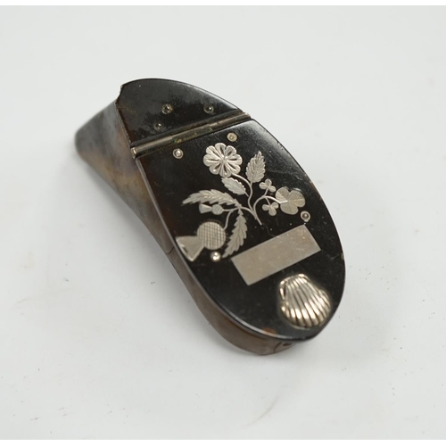 834 - A 19th century Scottish white metal inlaid shaped horn snuff box, 87mm. Condition - poor