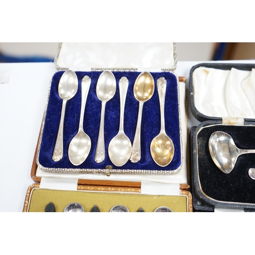 838 - Two cased sets of six silver coffee spoons including bean end and golfing related and two cased silv... 