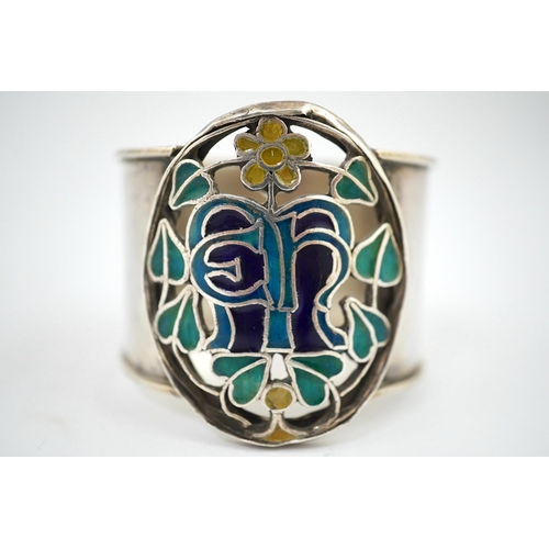 844 - An Arts and Crafts silver and enamel napkin ring, makers mark LH, Birmingham 1938, 4.5cm high. Cond... 