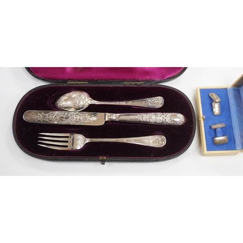 854 - A late Victorian cased chased silver christening trio, London, 1897/90, together with a pair of engr... 