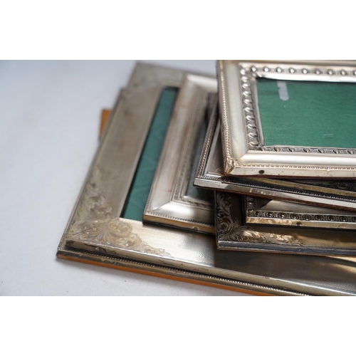 857 - Nine assorted late 20th century 800 standard white metal mounted photograph frames, mainly Italian, ... 