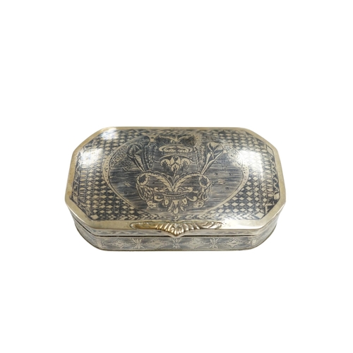 861 - A continental white metal and niello octagonal box, 10.9cm. Condition - poor to fair