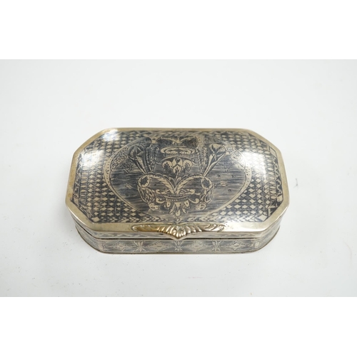 861 - A continental white metal and niello octagonal box, 10.9cm. Condition - poor to fair