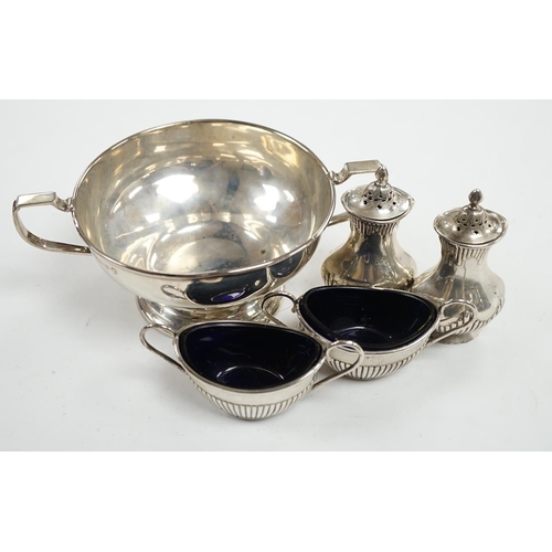 863 - A George V silver two handled bowl and two pairs of early 20th century silver condiments. Condition ... 