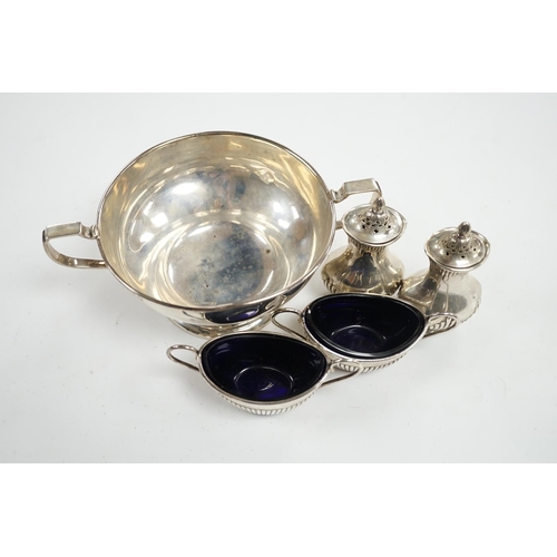 863 - A George V silver two handled bowl and two pairs of early 20th century silver condiments. Condition ... 