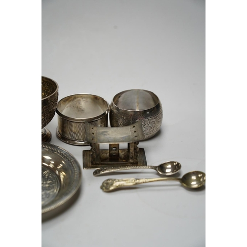 864 - Sundry small silver including five silver napkin rings, and 800 napkin ring, a Victorian silver must... 