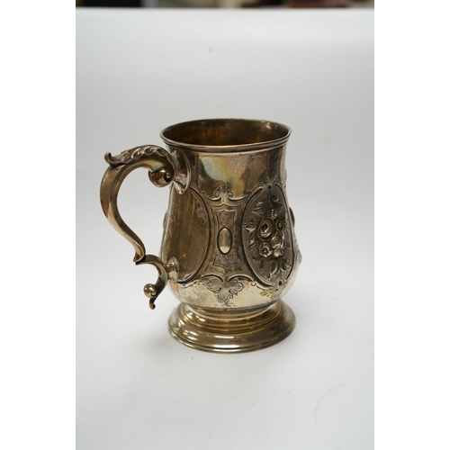 872 - A Victorian repousse silver baluster mug, by Robert Harper, London, 1868, height 13.1cm, 8.9oz. Cond... 