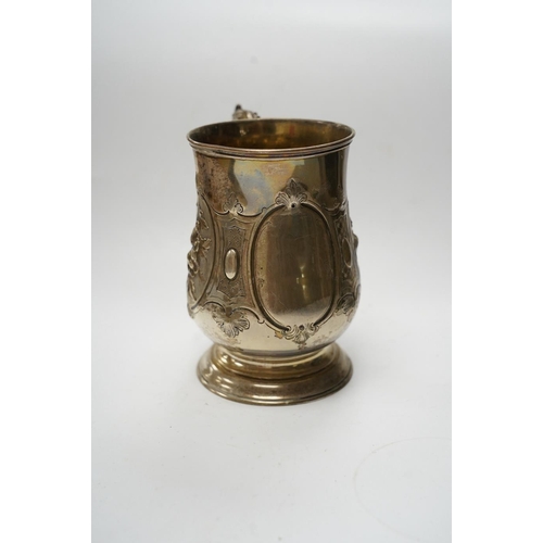 872 - A Victorian repousse silver baluster mug, by Robert Harper, London, 1868, height 13.1cm, 8.9oz. Cond... 