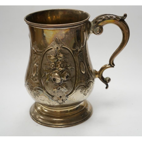 872 - A Victorian repousse silver baluster mug, by Robert Harper, London, 1868, height 13.1cm, 8.9oz. Cond... 