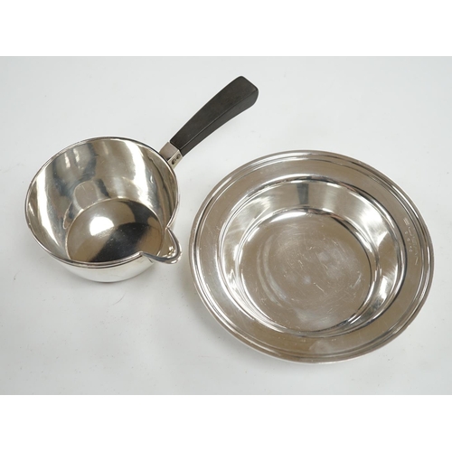 875 - A 1940's Danish white metal bowl and small saucepan with wooden handle, the latter stamped Heimburge... 