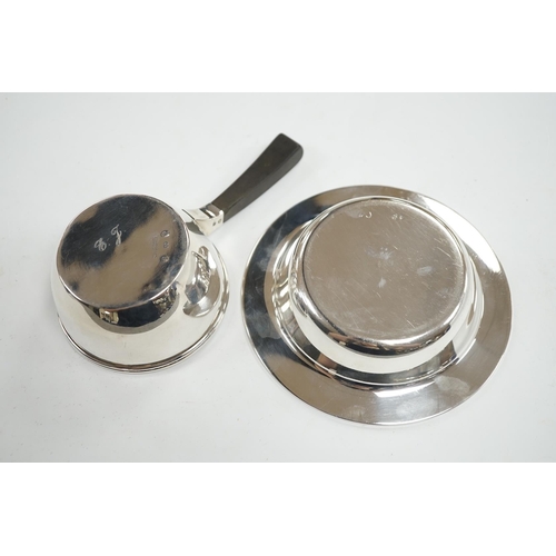 875 - A 1940's Danish white metal bowl and small saucepan with wooden handle, the latter stamped Heimburge... 