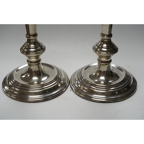 876 - A pair of Elizabeth II silver candlesticks, with turned columns, London, 1958 (maker's marks rubbed,... 