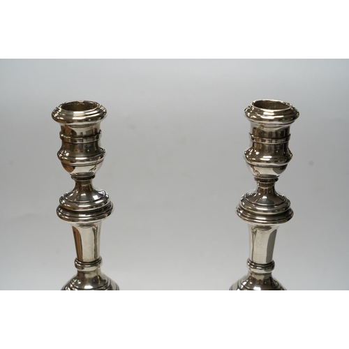 876 - A pair of Elizabeth II silver candlesticks, with turned columns, London, 1958 (maker's marks rubbed,... 