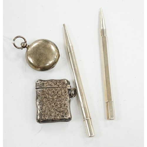 879 - A George V silver sovereign case, a silver vesta case and two silver propelling pencils. Condition -... 