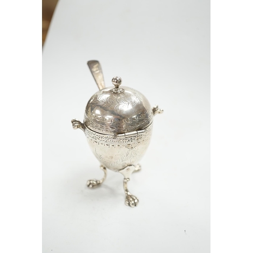 880 - A Victorian silver egg shaped mustard pot, on paw feet, London, 1867, 10.5cm, with an earlier silver... 