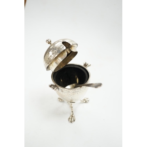 880 - A Victorian silver egg shaped mustard pot, on paw feet, London, 1867, 10.5cm, with an earlier silver... 