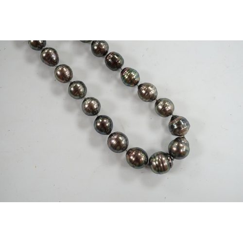 901 - A  modern single strand graduated Tahitian baroque cultured pearl necklace, with cabochon set yellow... 