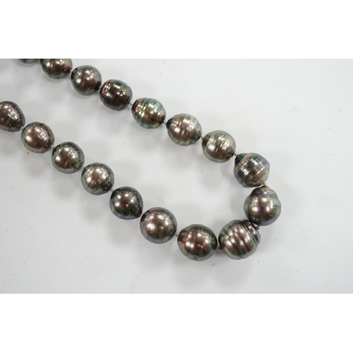 901 - A  modern single strand graduated Tahitian baroque cultured pearl necklace, with cabochon set yellow... 