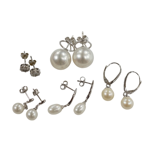 903 - Three assorted modern pairs of 9ct, cultured pearl and diamond chip set earrings, a similar diamond ... 