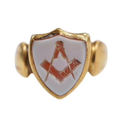 905 - A late Victorian 18ct gold and sardonyx set shield shaped Masonic signet ring, size Q/R, gross weigh... 