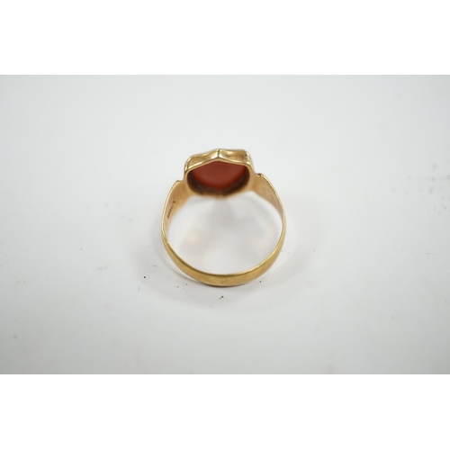 905 - A late Victorian 18ct gold and sardonyx set shield shaped Masonic signet ring, size Q/R, gross weigh... 