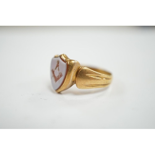 905 - A late Victorian 18ct gold and sardonyx set shield shaped Masonic signet ring, size Q/R, gross weigh... 