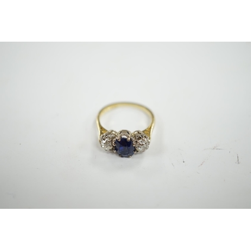 906 - A 1970's 18ct gold, sapphire and diamond set three stone ring, size J/K, gross weight 3.8 grams. Con... 