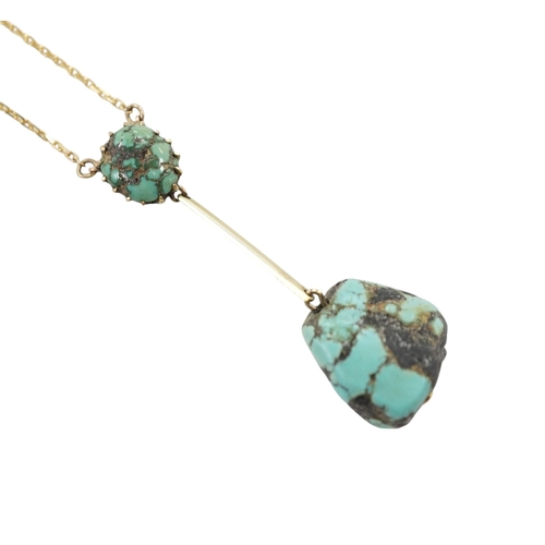 913 - A 375 and two stone turquoise drop pendant necklace, overall 54cm, gross weight 5 grams. Condition -... 