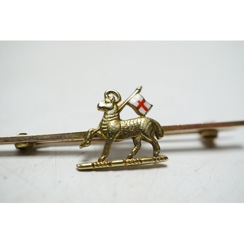 919 - A 14ct gold and enamel Welsh Guards sweethearts brooch, 3.2 grams, a 9ct gold fox head bar brooch wi... 