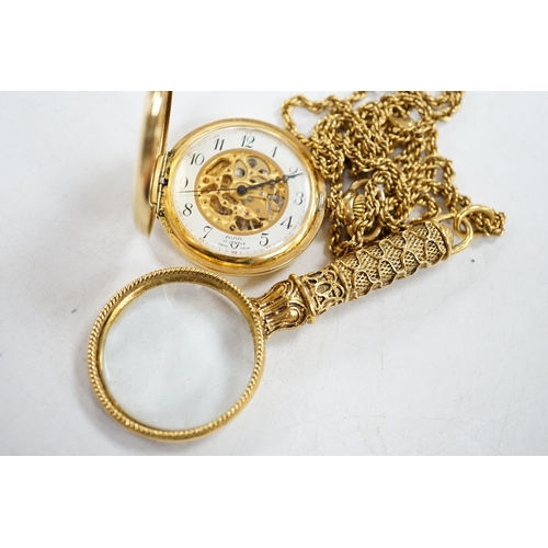 921 - A gold plated Avia keyless pocket watch, on gilt chain with magnifying glass. Condition - fair... 