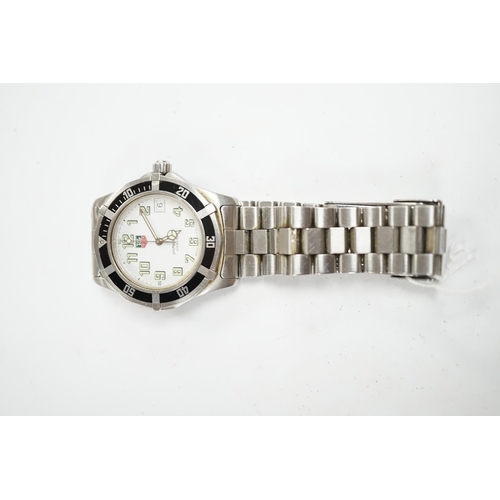 923 - A gentleman's recent stainless steel Tag Heuer Professional quartz wrist watch, no box or papers. Co... 