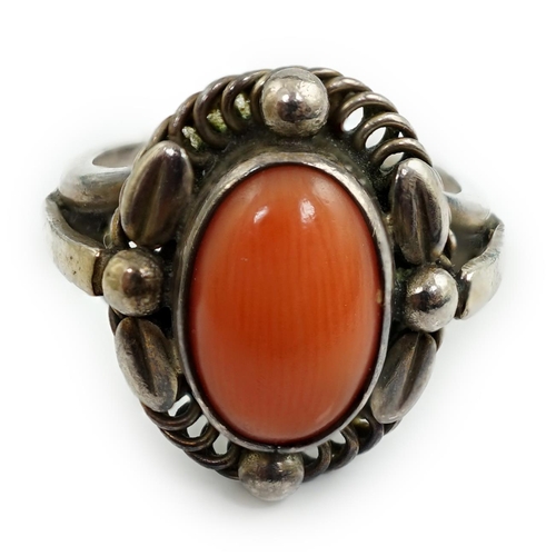 927 - A Georg Jensen sterling silver and cabochon coral set ring, design no. 1A, size L. Condition - fair ... 