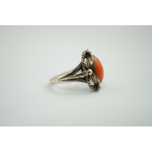 927 - A Georg Jensen sterling silver and cabochon coral set ring, design no. 1A, size L. Condition - fair ... 