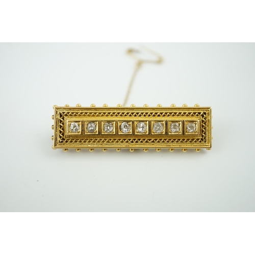 928 - A late Victorian gold and eight stone diamond set brooch, of rectangular form, with beaded border, 4... 