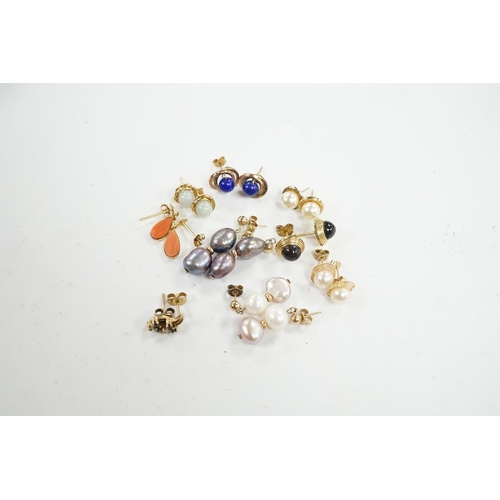 934 - Seven assorted modern pairs of 9ct and gem set earrings and two similar yellow metal pairs. Conditio... 