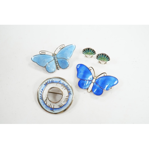 935 - Two Scandinavian gilt white metal and enamel butterfly brooches, largest 52mm, together with a white... 