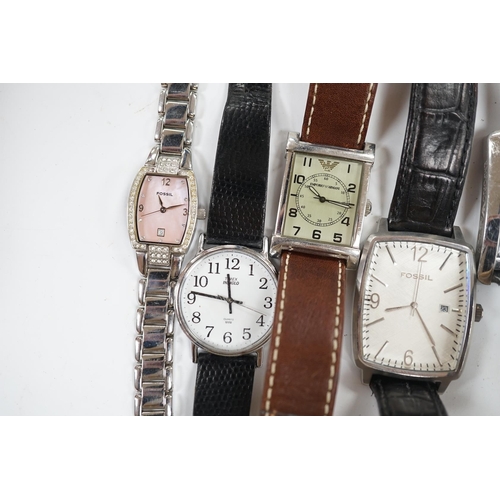 938 - Eight assorted lady's and gentleman's modern wrist watches including Emporio Armani, Esq and Fossil.... 