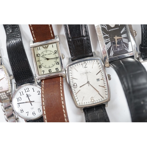 938 - Eight assorted lady's and gentleman's modern wrist watches including Emporio Armani, Esq and Fossil.... 