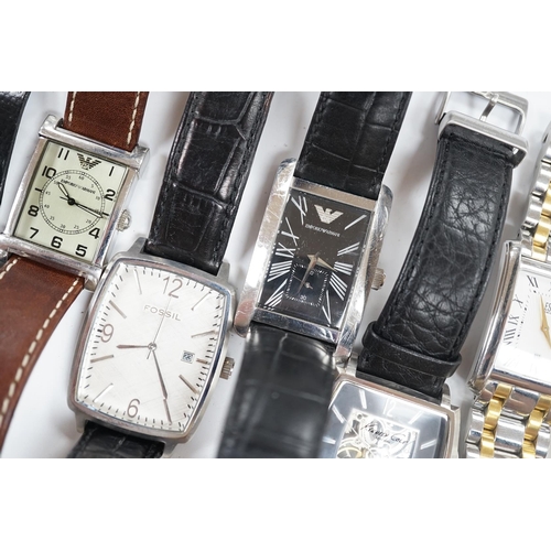 938 - Eight assorted lady's and gentleman's modern wrist watches including Emporio Armani, Esq and Fossil.... 