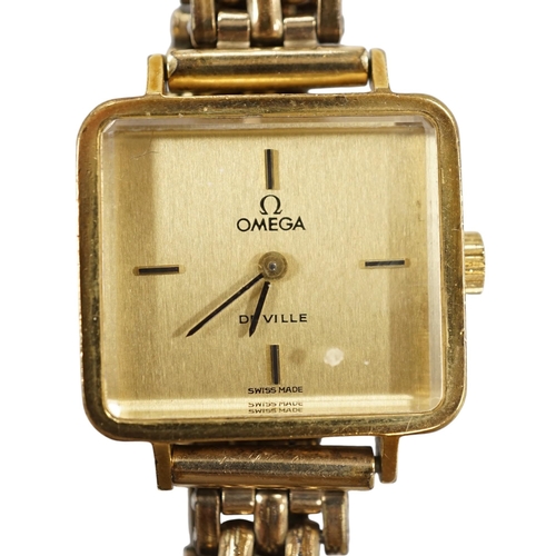 944 - A lady's steel and gold plated Omega De Ville manual wind wrist watch, on an associated gold plated ... 