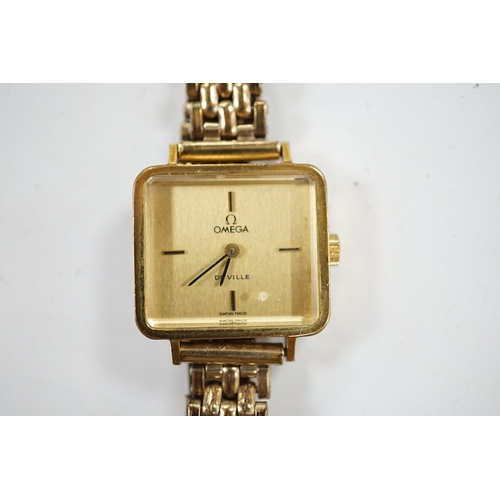 944 - A lady's steel and gold plated Omega De Ville manual wind wrist watch, on an associated gold plated ... 