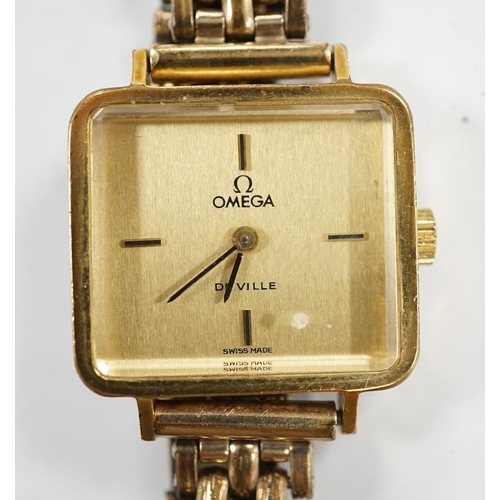 944 - A lady's steel and gold plated Omega De Ville manual wind wrist watch, on an associated gold plated ... 