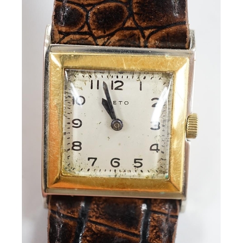 945 - A gentleman's 18ct gold and steel Veto square case manual wind wrist watch, on a leather strap. Cond... 