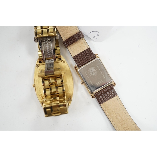 946 - A gentleman's recent gilt metal Citizen Eco-Drive wrist watch and one other Citizen watch. Condition... 