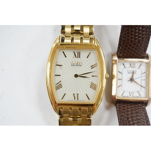 946 - A gentleman's recent gilt metal Citizen Eco-Drive wrist watch and one other Citizen watch. Condition... 