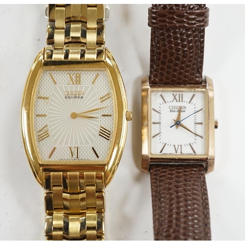 946 - A gentleman's recent gilt metal Citizen Eco-Drive wrist watch and one other Citizen watch. Condition... 